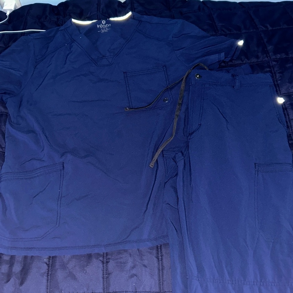 Navy blue infinity cherokee scrubs size L both top and bottom.